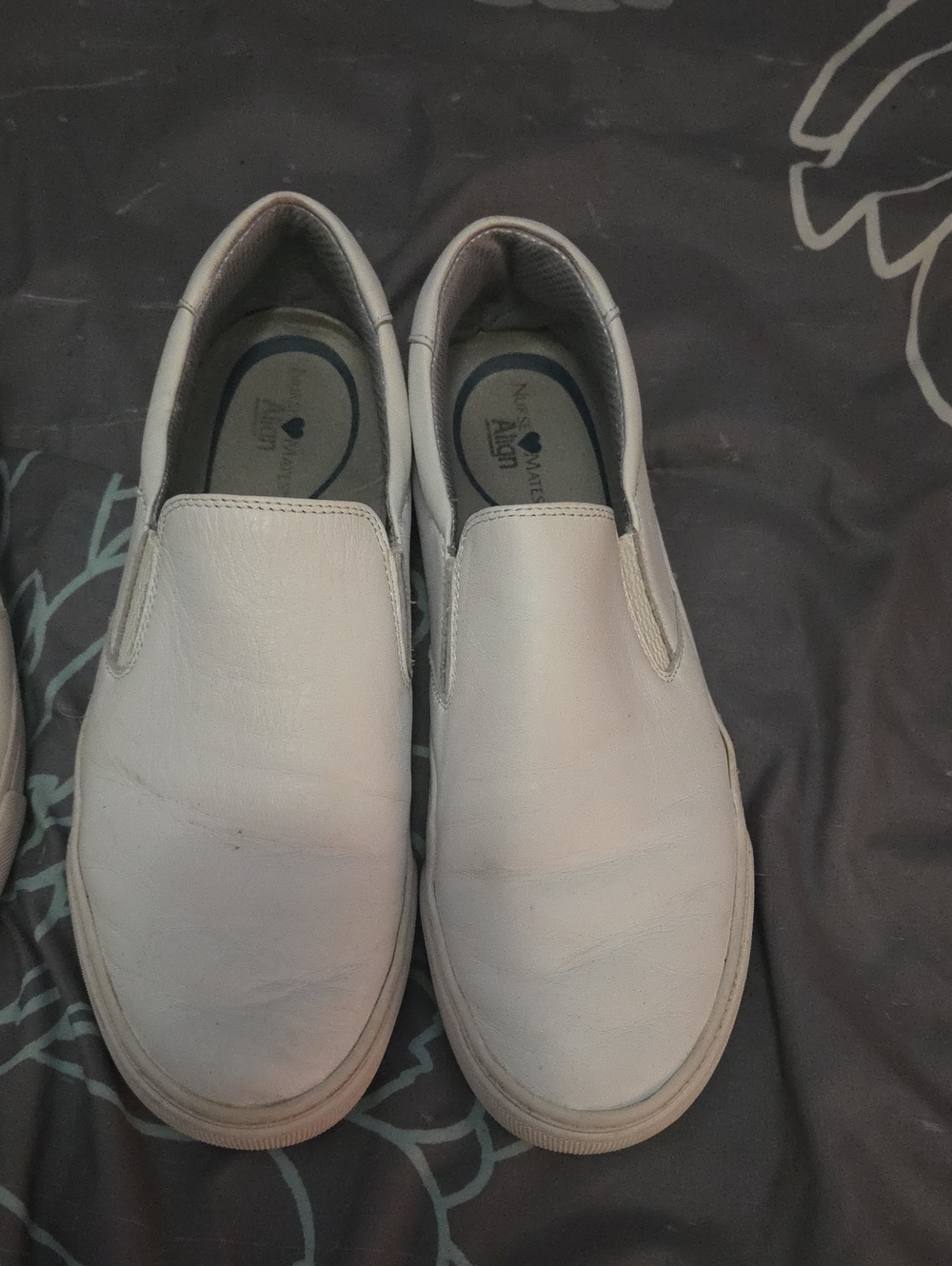 2 Pair Of Womens White Slip-On Shoes